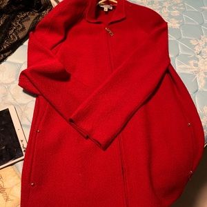 Red suit. Jacket and skirt
